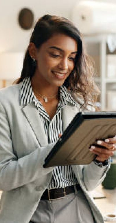 Small business, woman and tablet for e commerce, startup and inventory management of online shop, order or courier. Entrepreneur or Indian seller on digital technology for logistics, boxes or package